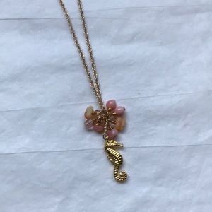 Gold, coral, crystal bead sea horse necklace